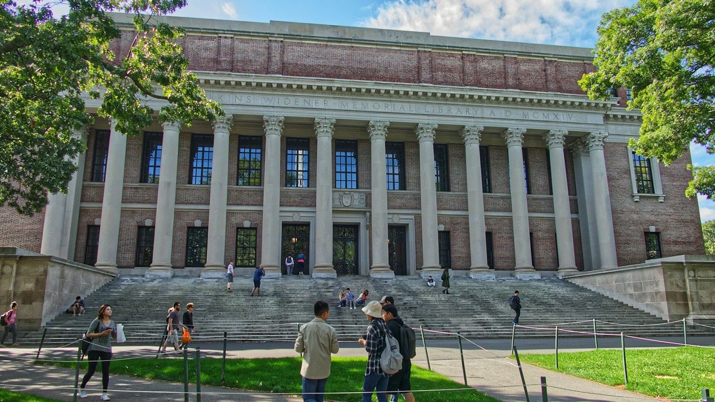 Students on the steps of a university library